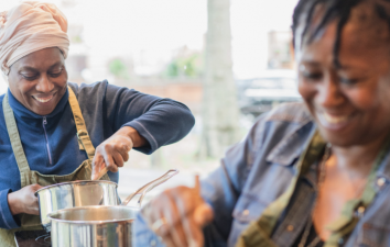 stirring pan at cooking class